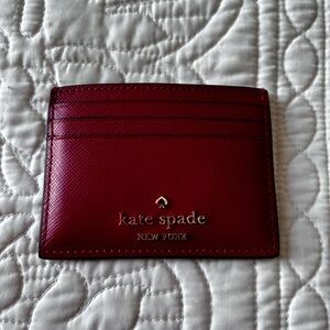 Kate Spade card holder in excellent condition.